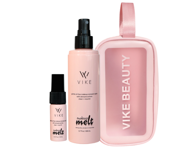A collection of beauty products by VIKE Beauty, including a travel bag and several bottles of Makeup Melt in different sizes, all in a matching soft pink color scheme.


